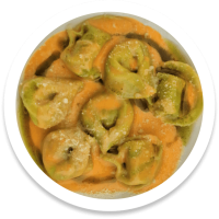 Tortelloni de Espinacas y Queso Mató con crema de Tomates Confitados